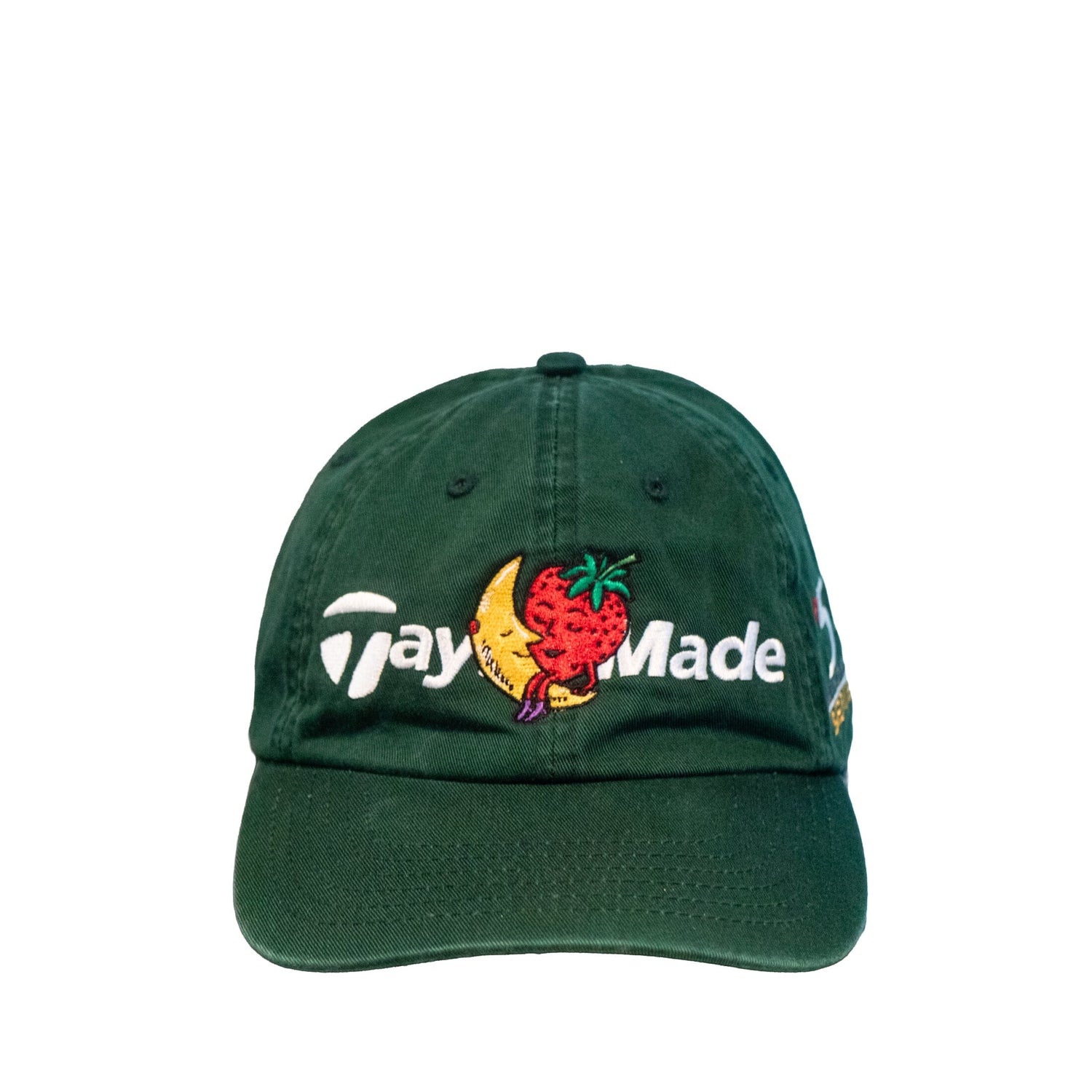 Green cap with Taylormade logo on a white background